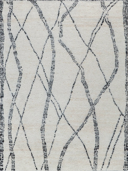 Cream rug with navy crisscross lattice pattern & dark border, modern abstract woven textile.