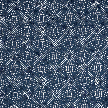Navy blue fabric with a white dotted interlaced knot pattern, textile texture.
