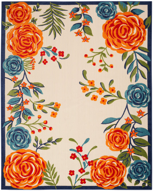 Rectangular beige area rug with vivid orange and teal flowers, green leaves, navy border, decorative botanical print.