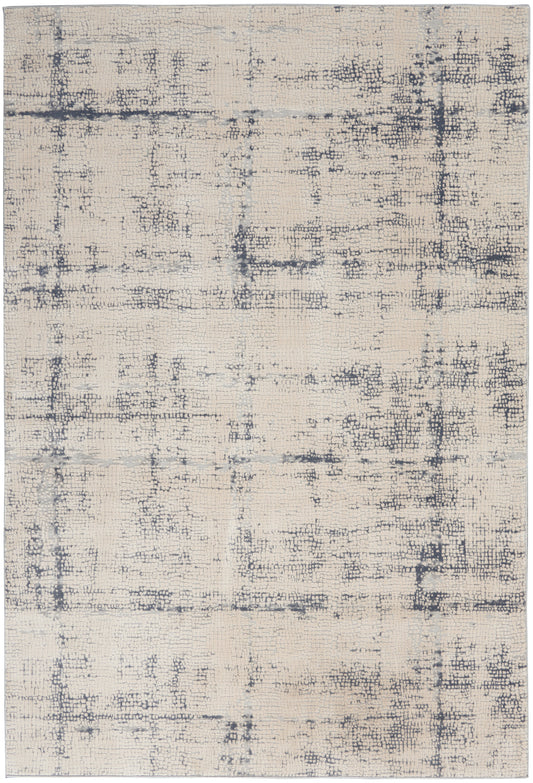 Beige abstract distressed area rug with charcoal grid pattern; rustic low-pile rug.