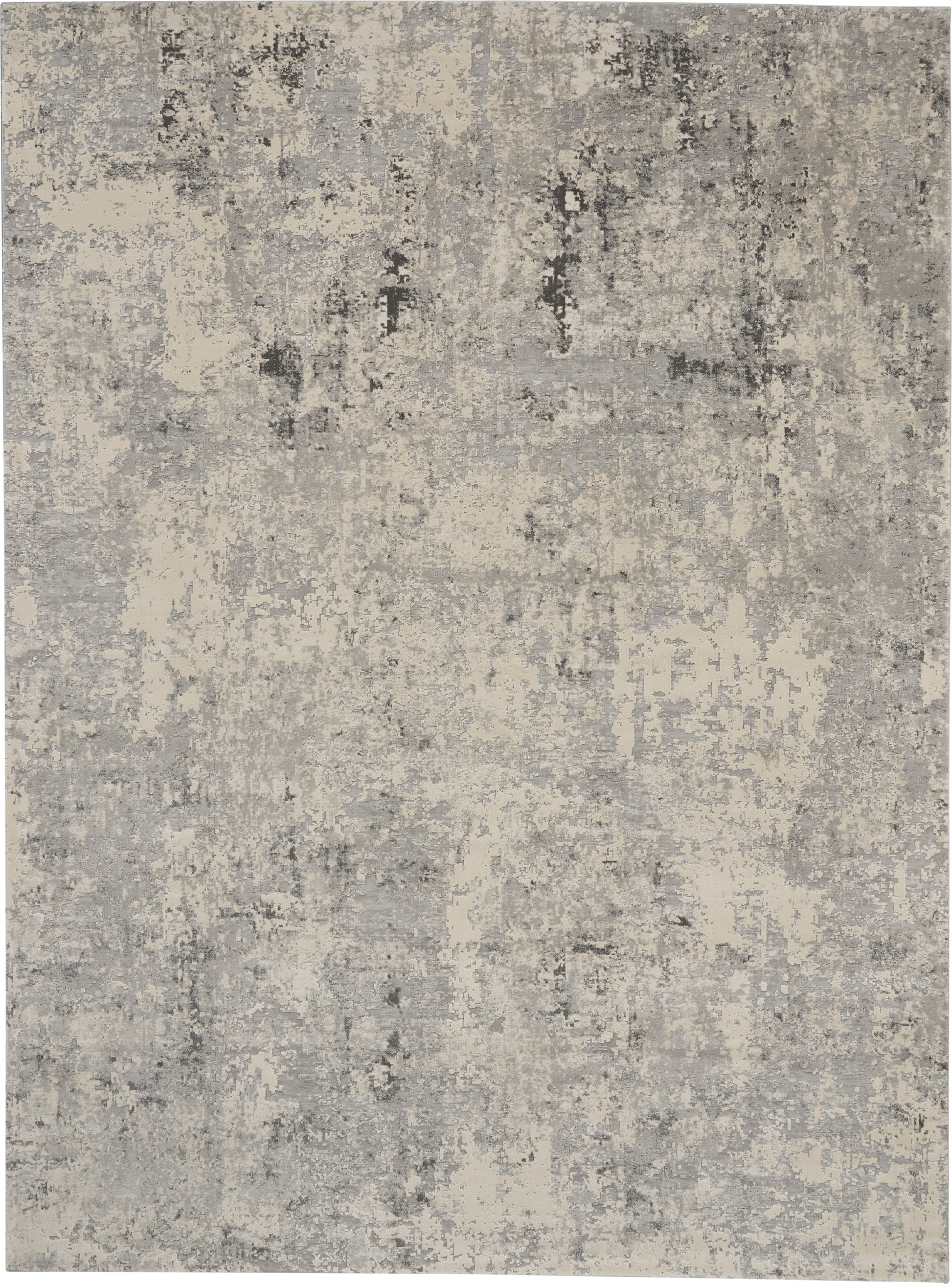 Rectangular area rug in gray and beige with a distressed abstract pattern and modern, muted tones.