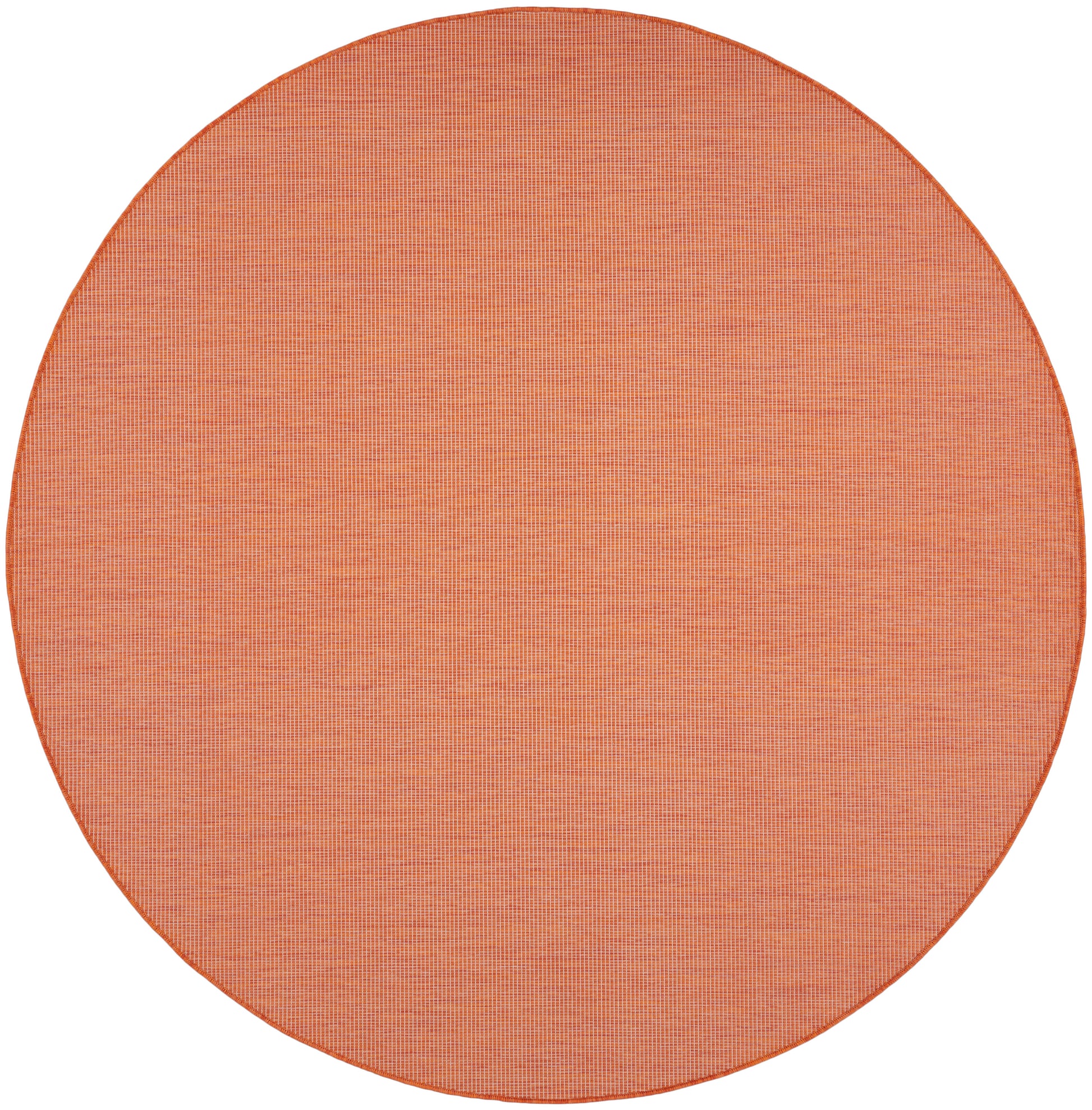 Round orange woven placemat with crosshatch texture, ideal for table setting.