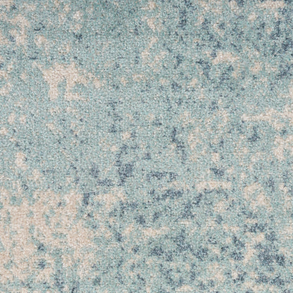 Blue and cream abstract textured area rug with a soft pile; modern, neutral decor for living spaces.