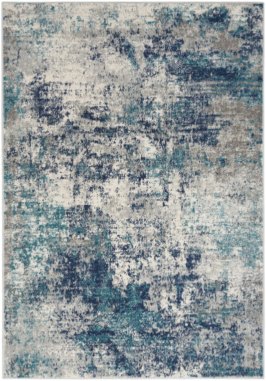 Abstract distressed area rug (5' x 7') with teal, navy, gray & beige tones in an irregular painterly pattern