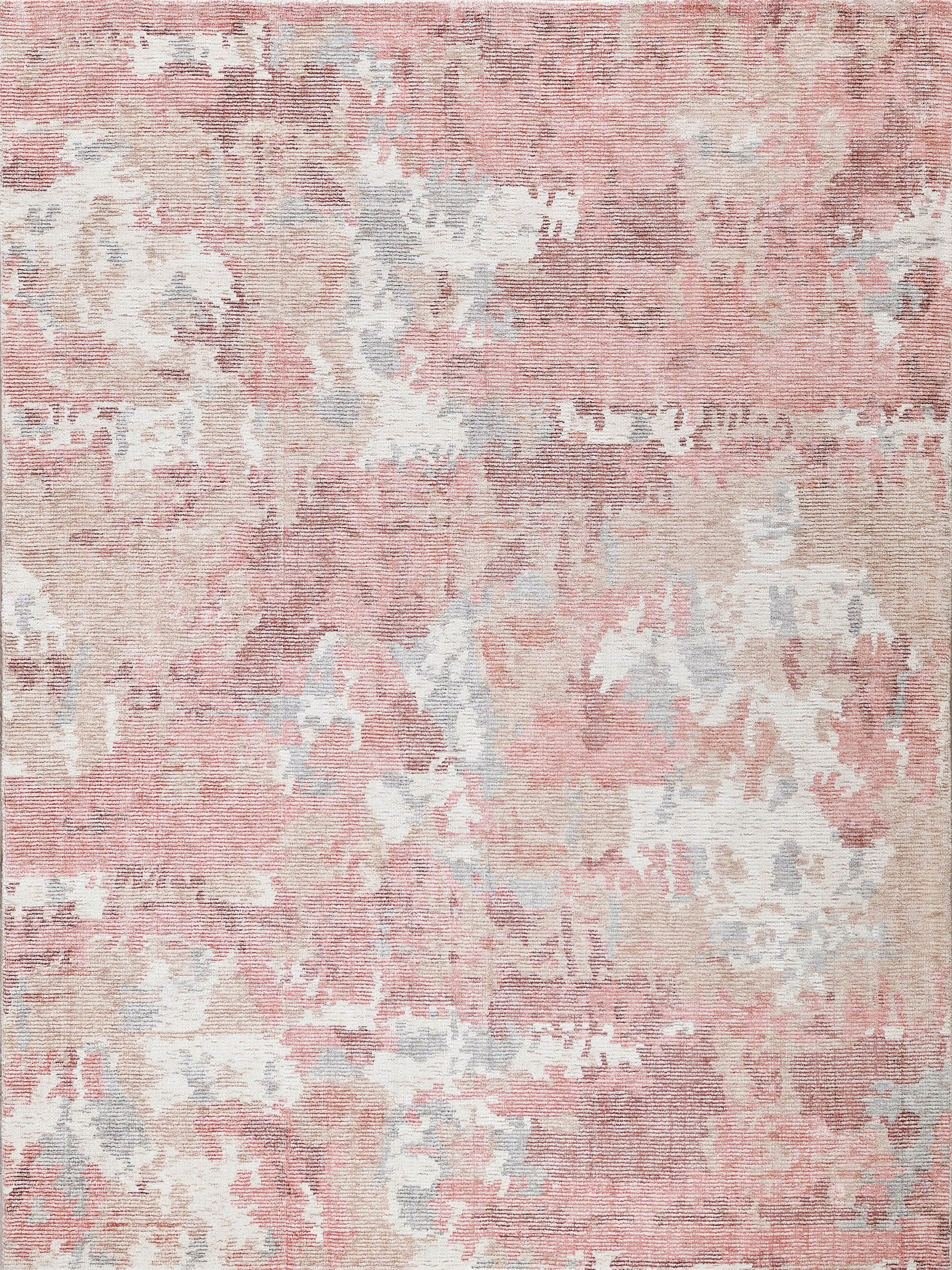 Distressed pink and peach area rug with ivory and light blue accents; soft medium-pile, ideal for living rooms.
