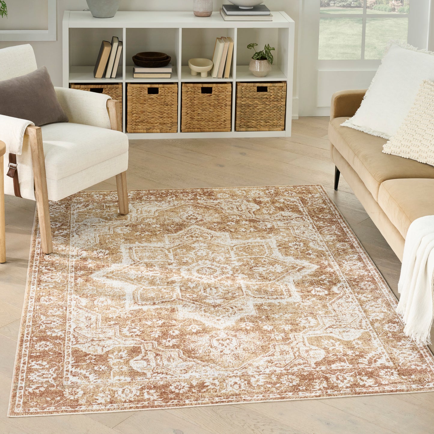 Beige oriental rug with cream accents in a modern living room; light wood floor, white cubby shelves, neutral seating.
