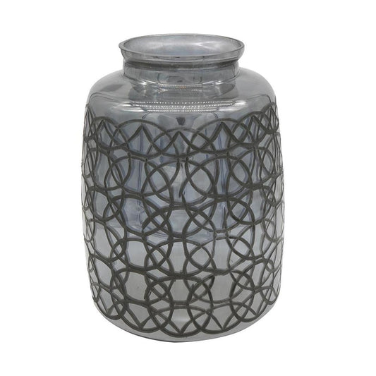 Smoky gray glass jar with black interlocking circle lattice wrap; cylindrical candle holder.