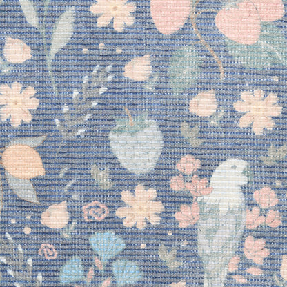 Pastel floral print fabric with peach and pink flowers, mint leaves and a light blue bird on a blue striped background.