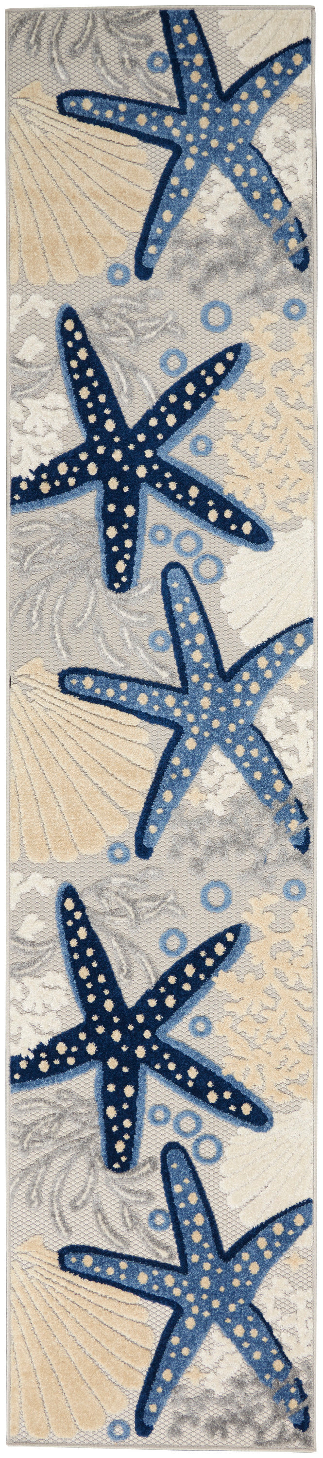 Beach-themed runner rug with navy-blue starfish, pale shells and circles on a light gray background.