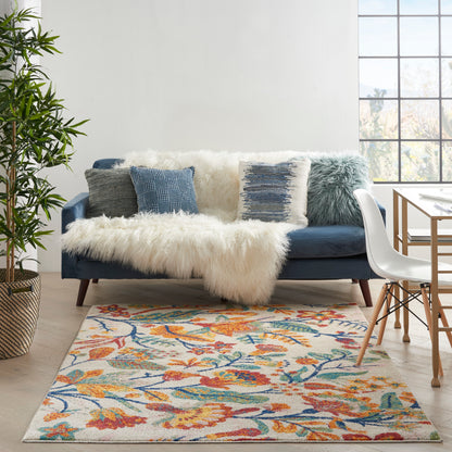 Colorful floral Bohemian rug, 4' x 6', on the floor by a large window.