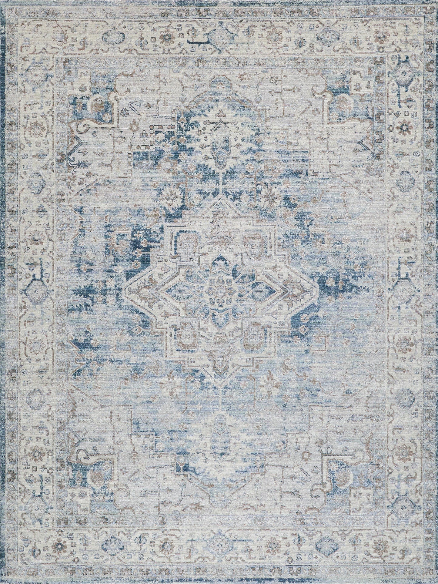 Distressed blue and ivory oriental rug with central floral medallion and ornate border; vintage decorative floor accent.