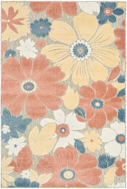 Floral area rug with large peach, yellow and white blossoms and blue accents on a beige background.