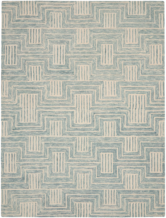 Beige area rug with blue interlocking stepped-square lines forming a repeating labyrinth motif.