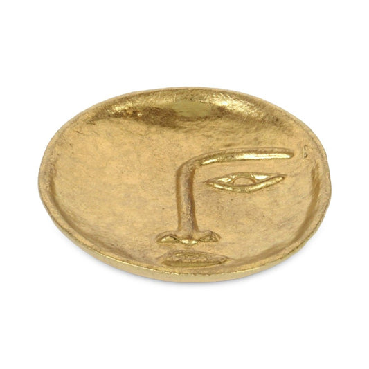 8" gold cast iron oval trinket tray with an abstract face motif