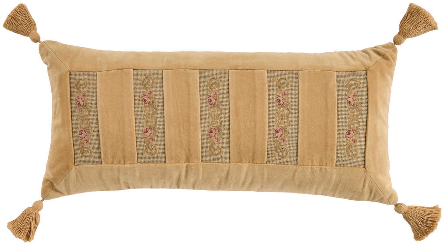 Rectangular tan decorative throw pillow with tassels on all four corners and vertical embroidered panels.