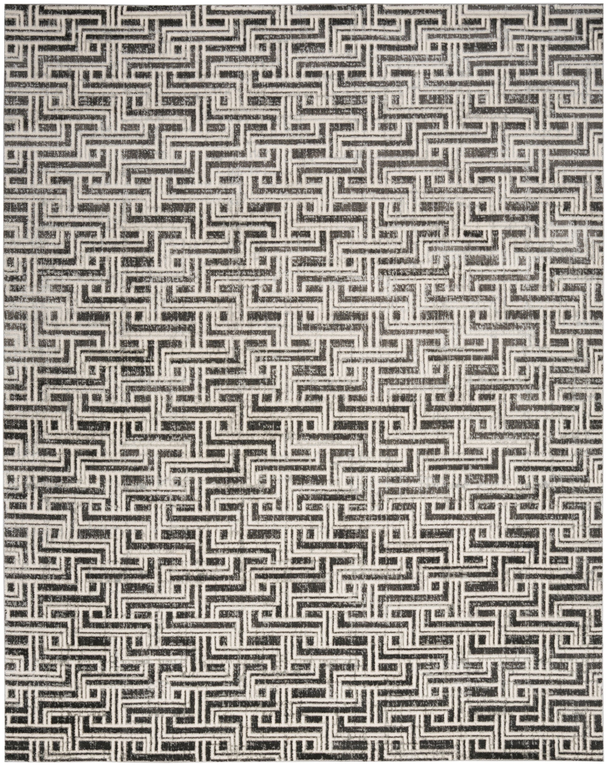 Black and ivory interlocking geometric maze pattern rug; bold Greek-key style for decor.