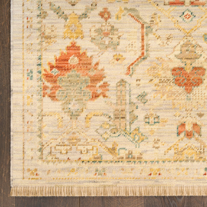Cream oriental rug with pastel floral motifs, red and teal accents, fringed border; rectangular living-room rug, 6' x 9'.
