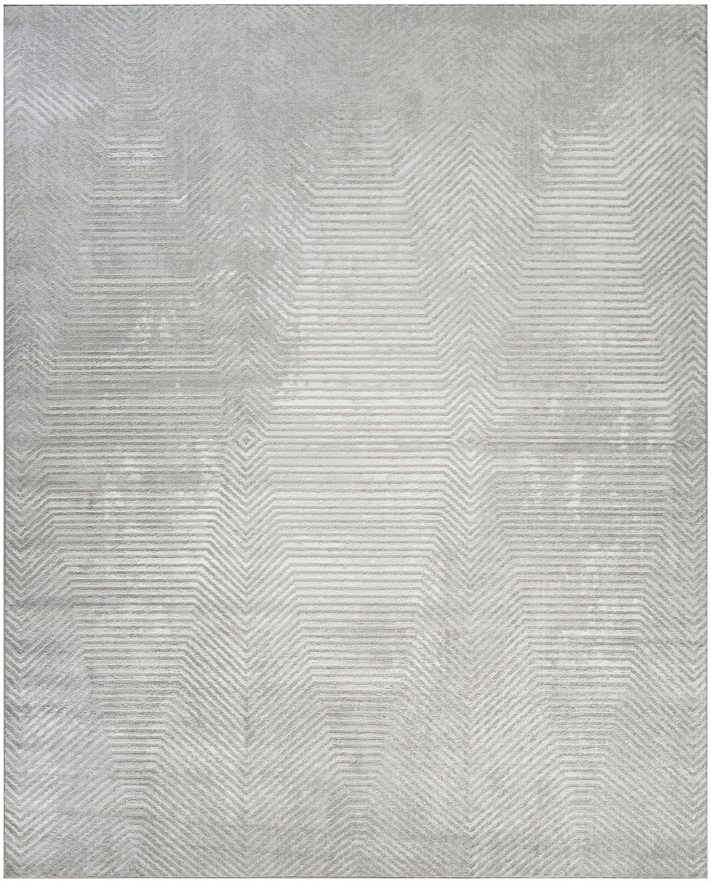 Grey area rug with a soft texture and subtle chevron geometric pattern, size 8' x 10'.