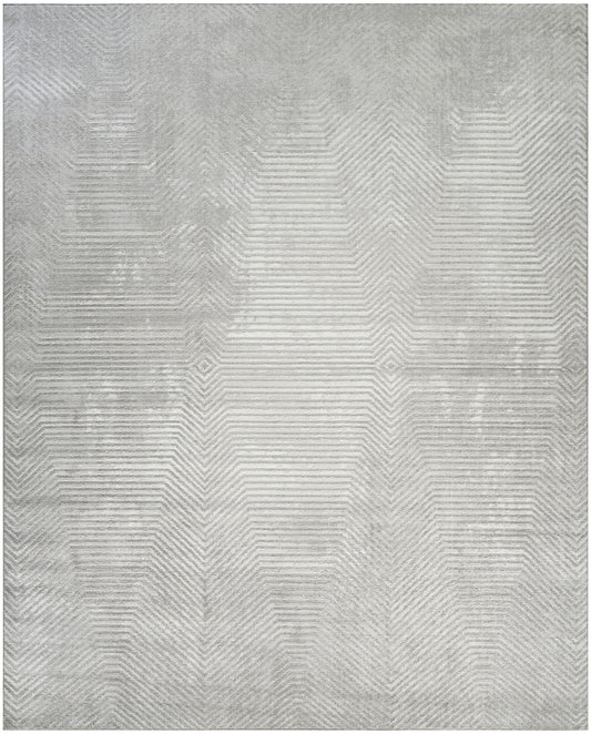 Grey area rug with a soft texture and subtle chevron geometric pattern, size 8' x 10'.