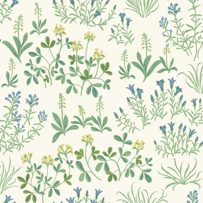 Seamless botanical leaf pattern featuring blue and yellow leaves with green accents on cream background