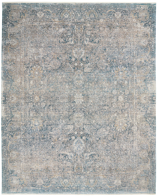 Distressed blue and beige oriental rug with ornate floral border and faded vintage pattern.