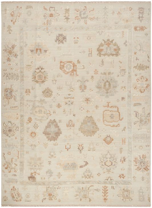 Ivory-toned rectangular oriental rug with soft peach accents, distressed motif patterns and subtle border.