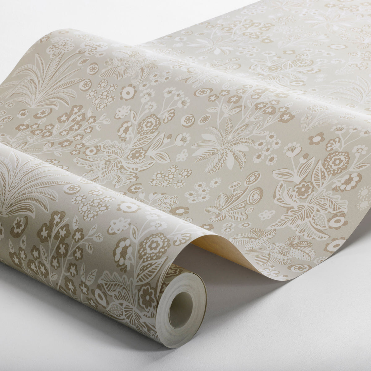 Cream wallpaper with white damask floral pattern, rolled sheet; elegant vintage wall decor.