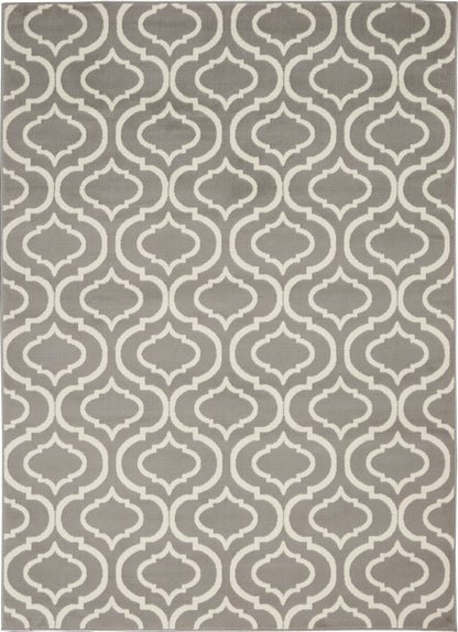 Grey and ivory trellis-pattern rug with repeating arabesque motifs and a light border; woven flat-weave style.