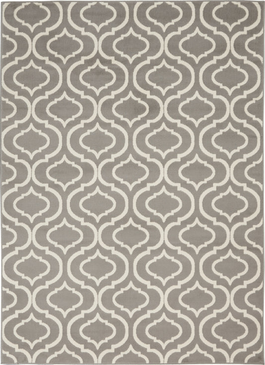 Grey and ivory trellis-pattern rug with repeating arabesque motifs and a light border; woven flat-weave style.