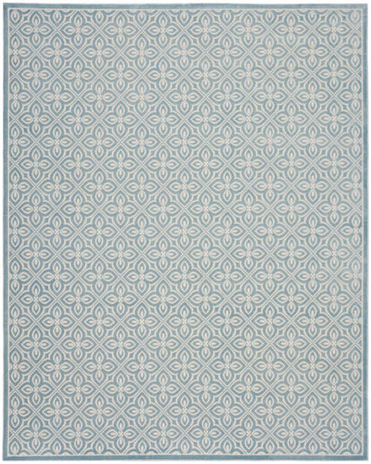 Blue-gray area rug featuring a white geometric lattice pattern with a light border.