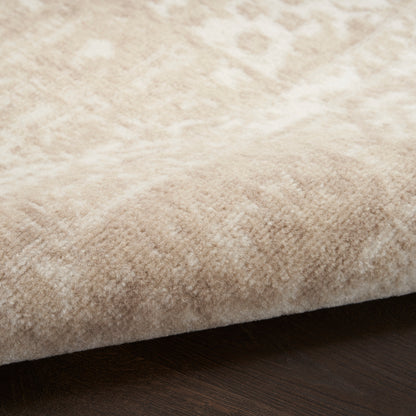 Beige plush runner rug with dense, soft pile on dark wood floor.