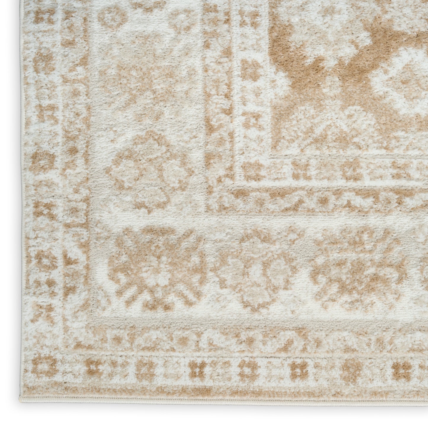 Cream-beige oriental area rug with subtle floral medallion patterns and decorative borders.