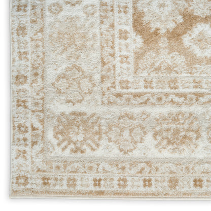 Cream-beige oriental area rug with subtle floral medallion patterns and decorative borders.