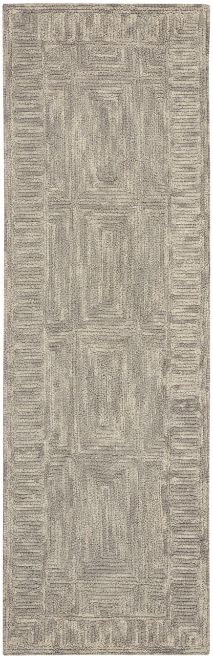 Beige hallway runner rug with plush textured surface and geometric border in taupe tones.