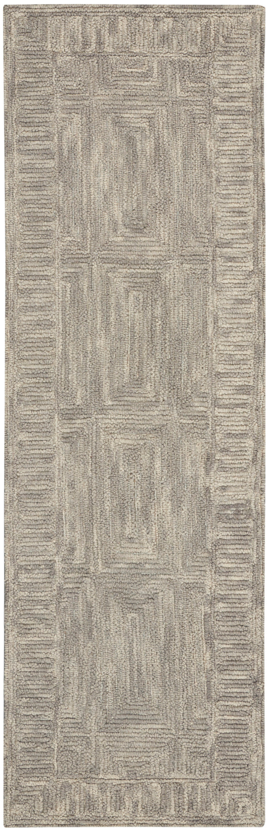 Beige hallway runner rug with plush textured surface and geometric border in taupe tones.