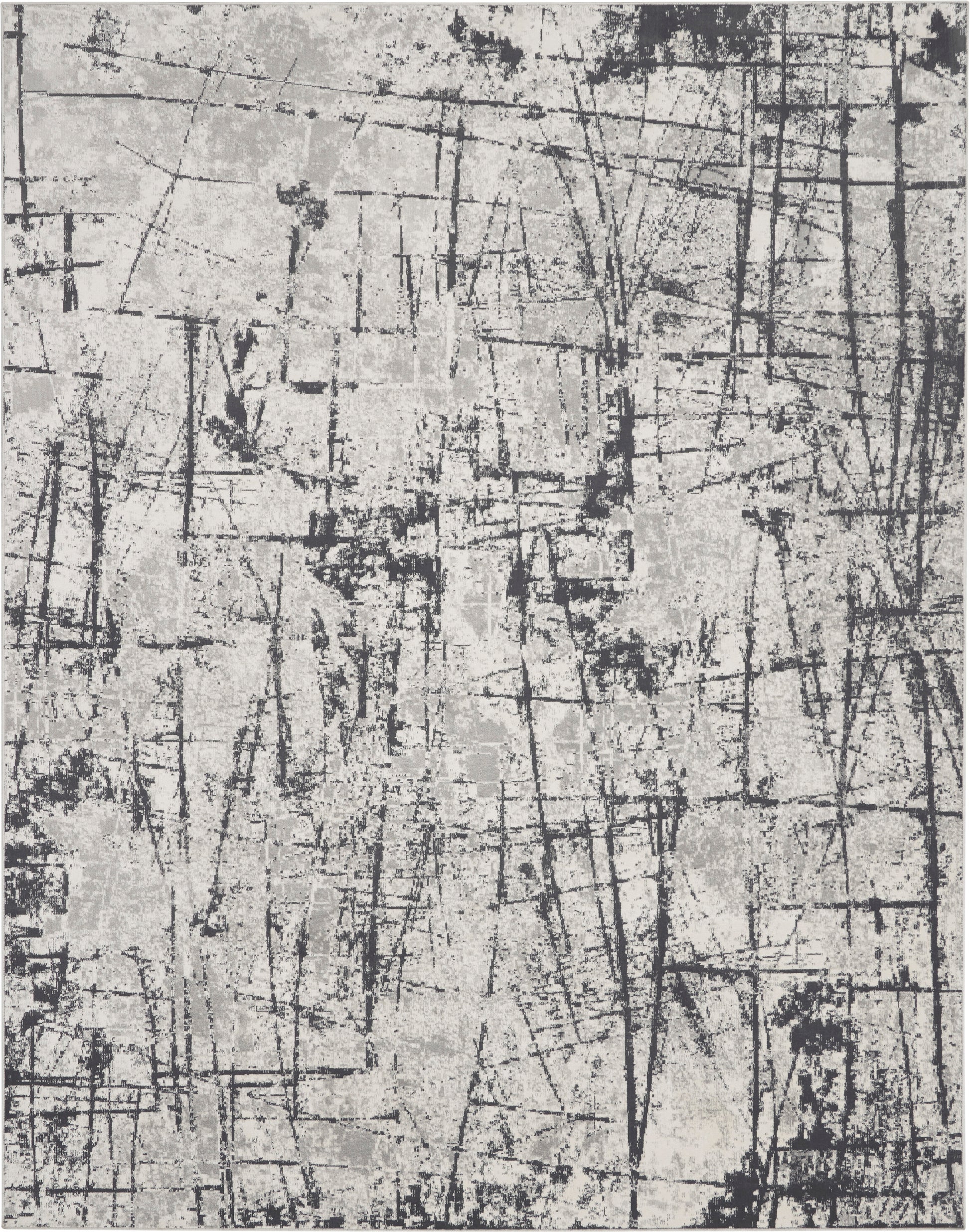 Gray and black abstract textured rug with scratch lines and crosshatch patterns.