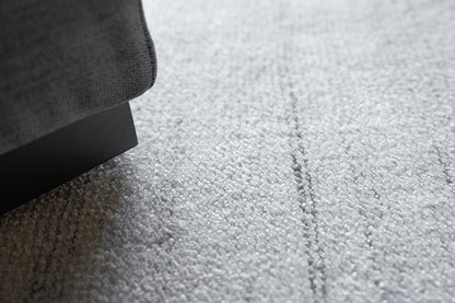 Dark gray hand-loomed indoor rug with a textured surface, 6' x 9'.