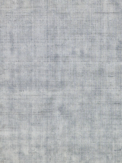Light blue-gray linen-like rug texture with subtle woven grain.