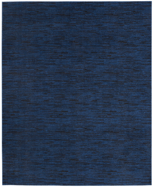 Navy blue rectangular outdoor rug with a subtle heathered texture.