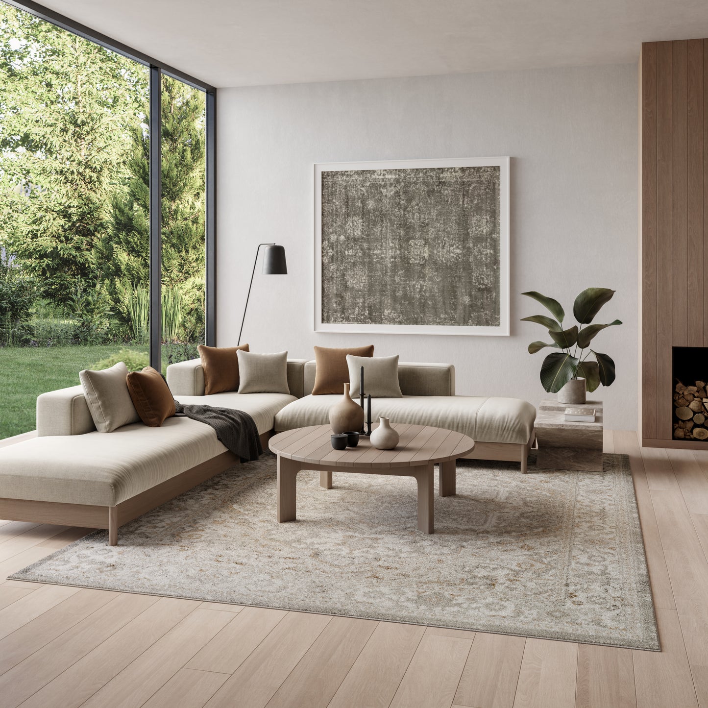 Vintage 8' x 10' rug in beige tones in a living room with window, abstract wall art & plant.