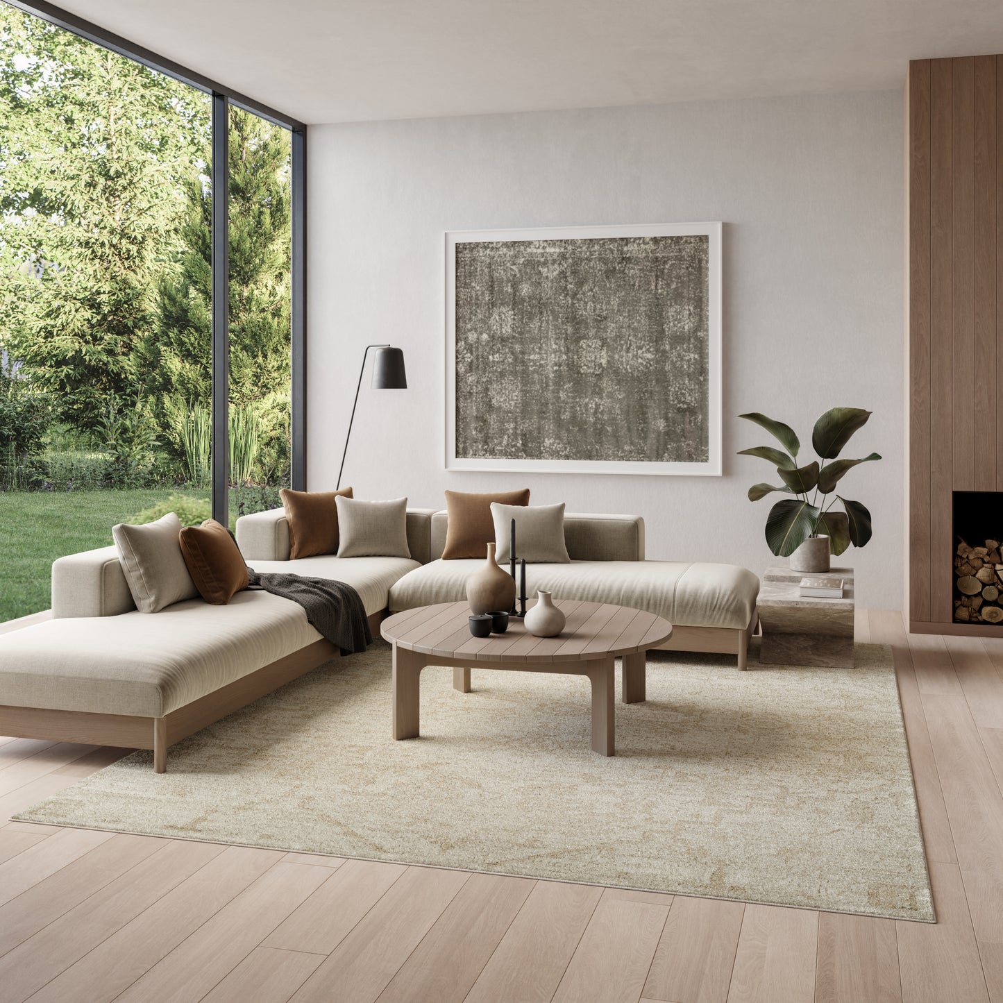 Neutral-tone modern living room with beige sectional, round wooden coffee table, large glass wall, abstract art, rug and plant.