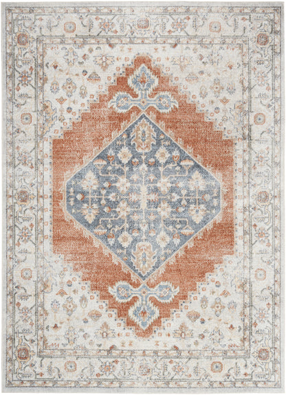 Distressed vintage oriental rug with a blue diamond medallion, rust-orange frame, ivory border and floral motifs.