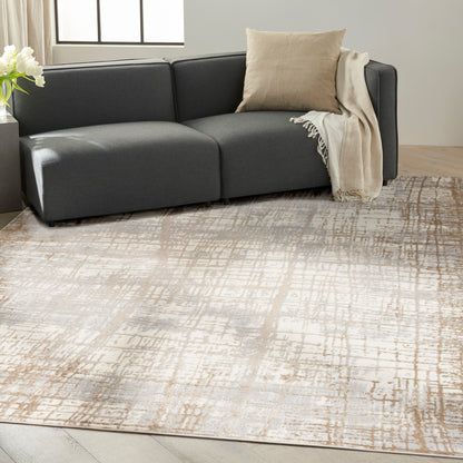 Dark gray modern rug with a neutral abstract pattern, 7' x 10', in a contemporary living room.