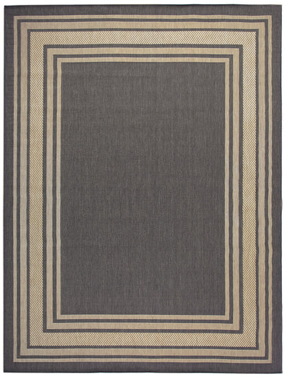 Charcoal gray rug with nested beige borders; geometric concentric rectangles, woven texture for modern living room.