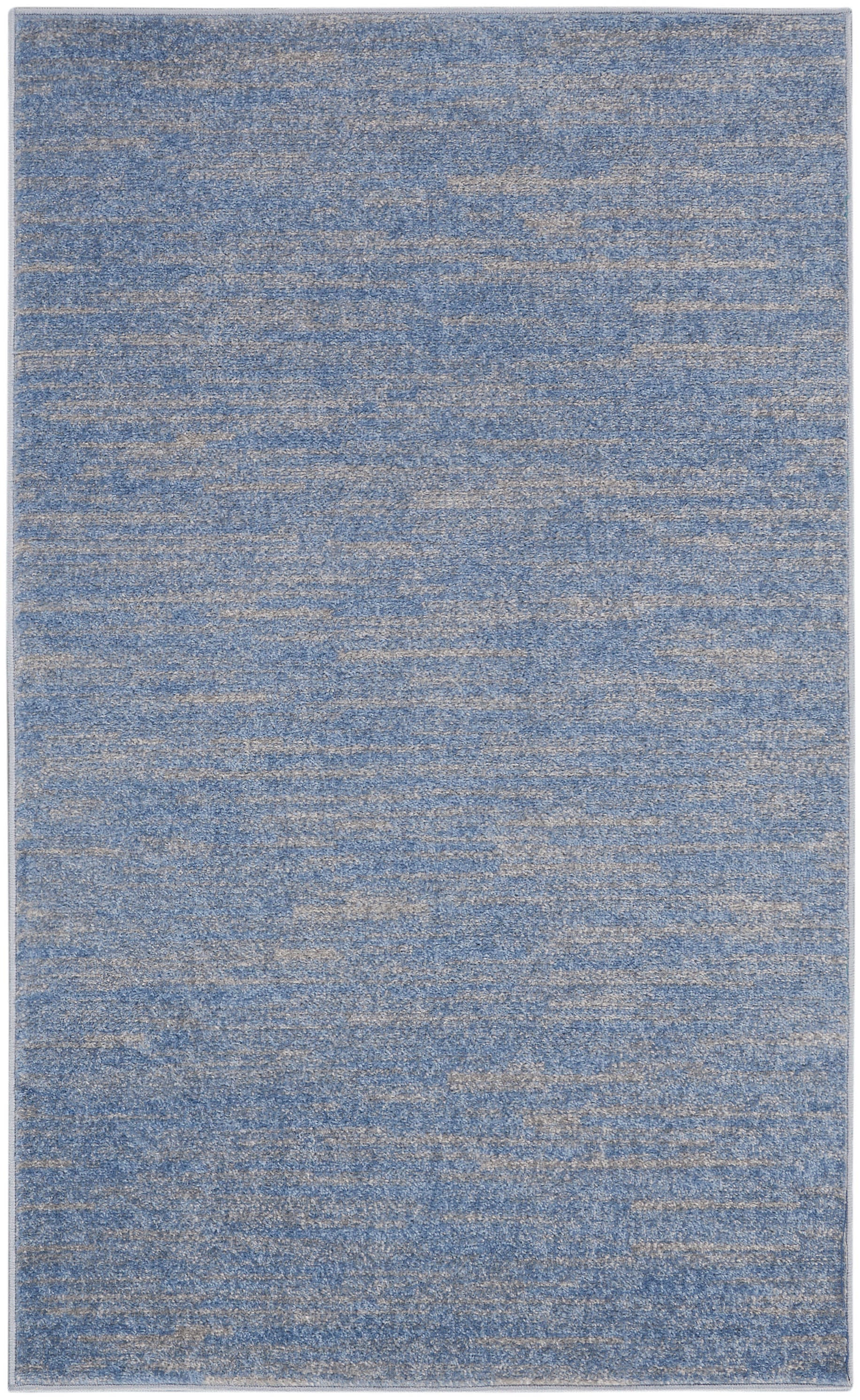 Blue and beige-speckled rectangular area rug with a soft, textured pile.