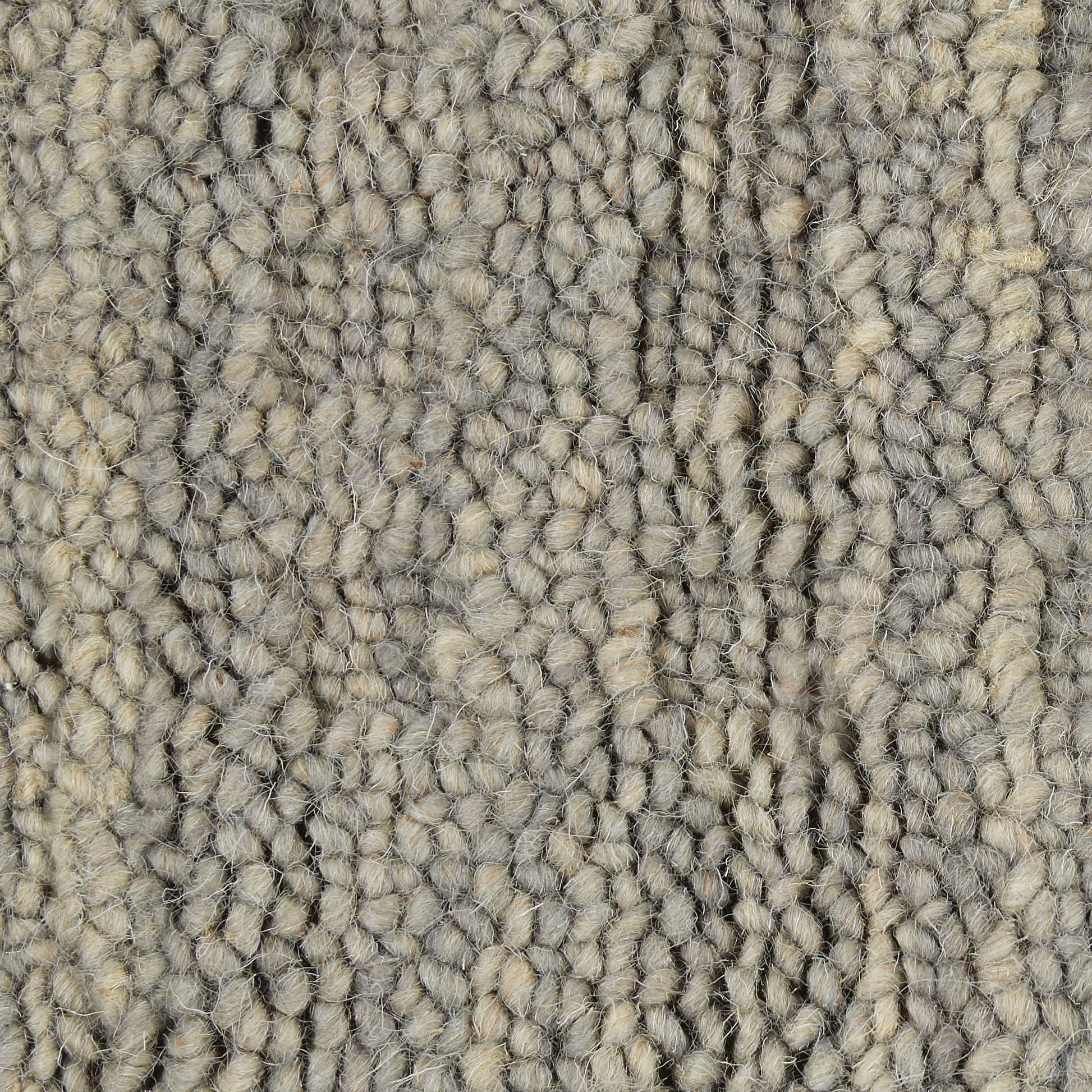 Neutral gray-beige loop-pile rug runner close-up; dense textured yarns for a soft, durable floor covering.