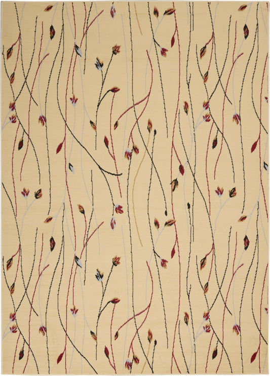 Beige area rug with abstract curling vines in black, red, and pale blue and tiny multicolor leaves.