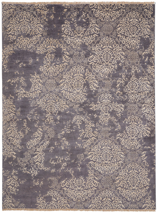 Purple indigo area rug with beige damask pattern and distressed vintage look; rectangular woven rug.
