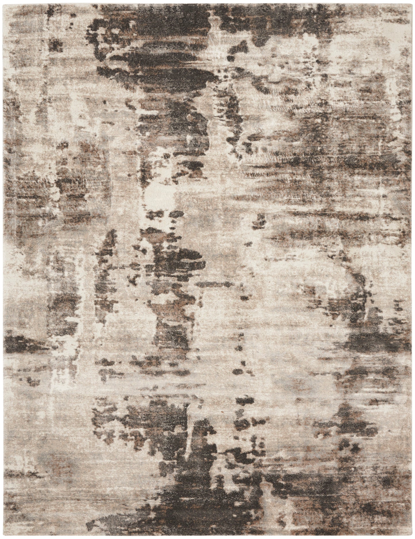 Abstract beige-brown distressed area rug with charcoal gray patches; rectangular modern living room rug