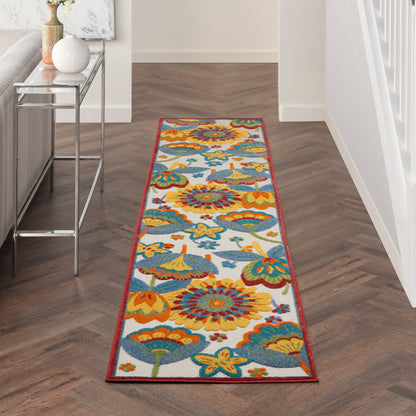 Boho floral hallway runner rug with bold yellow, teal and orange blooms on cream, red border.